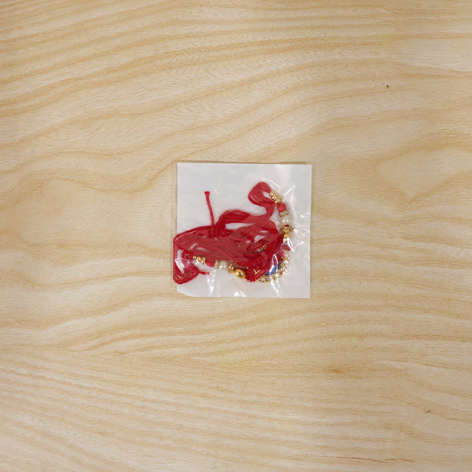 Mere Ram Text Red Enamel Gold Tone Rakhi