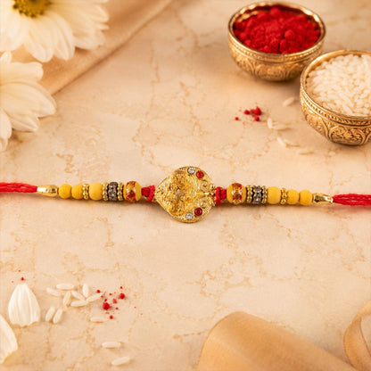 Golden Tone Rakhi showing thread detail