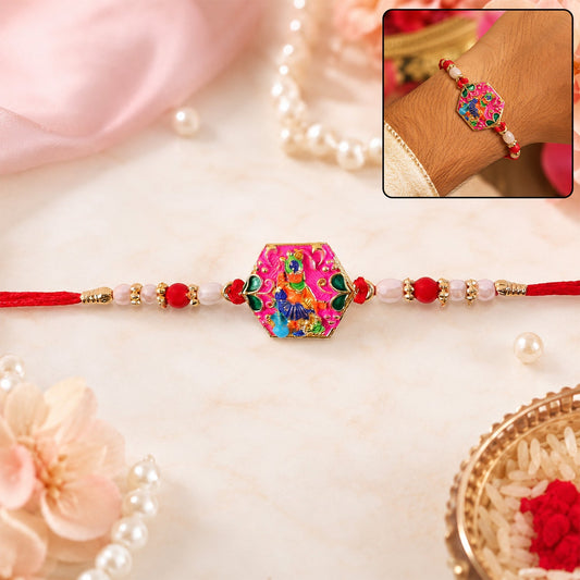 Close-up of multicolor enamel gold tone rakhi
