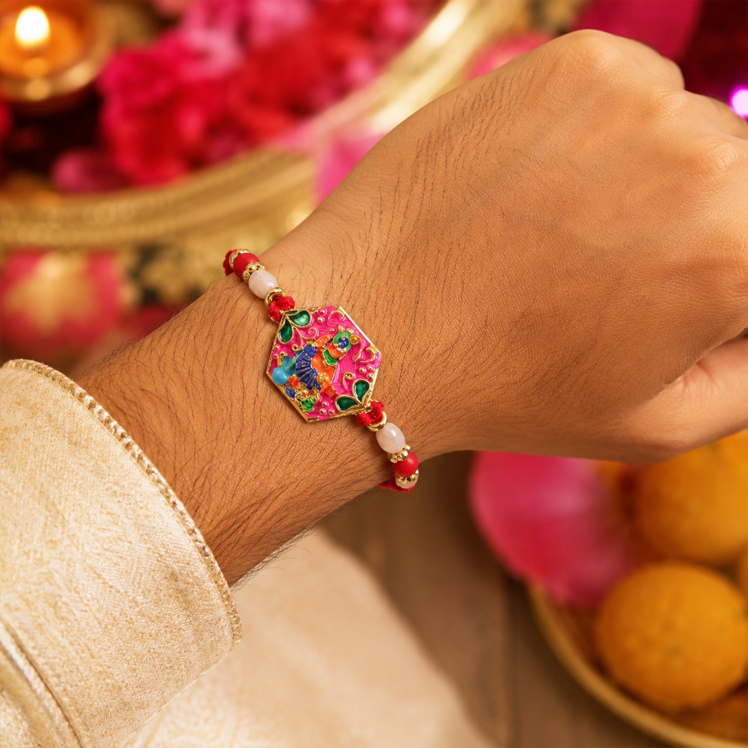 Multicolor enamel rakhi on white background