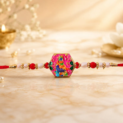 Top view of multicolor enamel gold tone rakhi