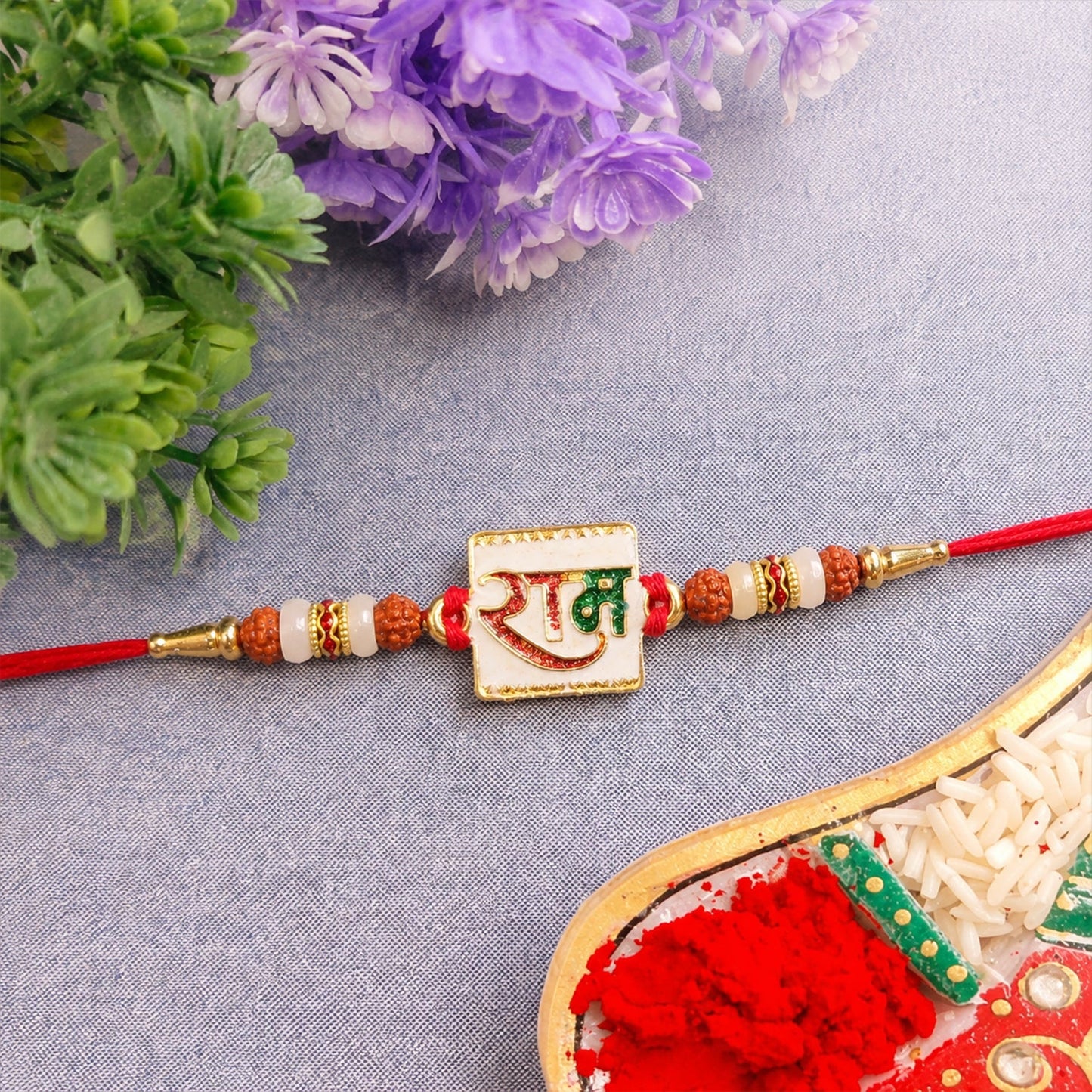 Ram Text White Enamel Gold Tone Rakhi with thread detail