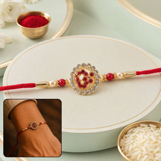 Om Stone Studded Gold Tone Rakhi, front view