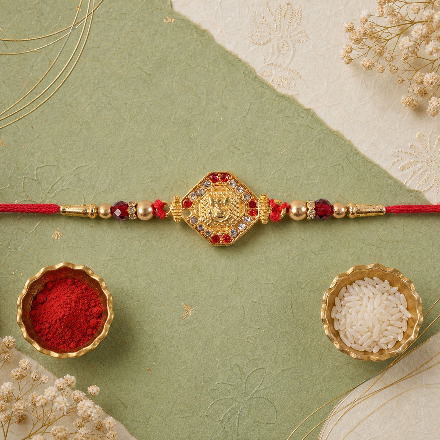 Lord Ganesha Red Enamel Gold Tone Rakhi