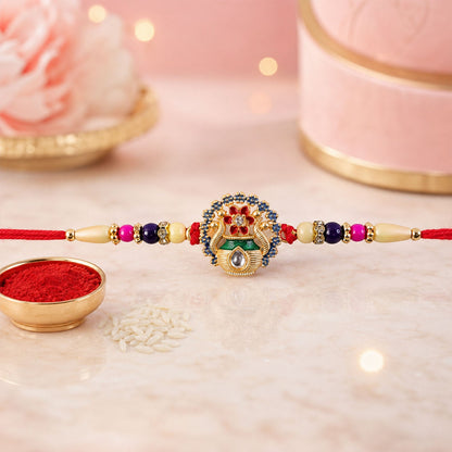 Close-up of Kalash design & vibrant beads on Rakhi