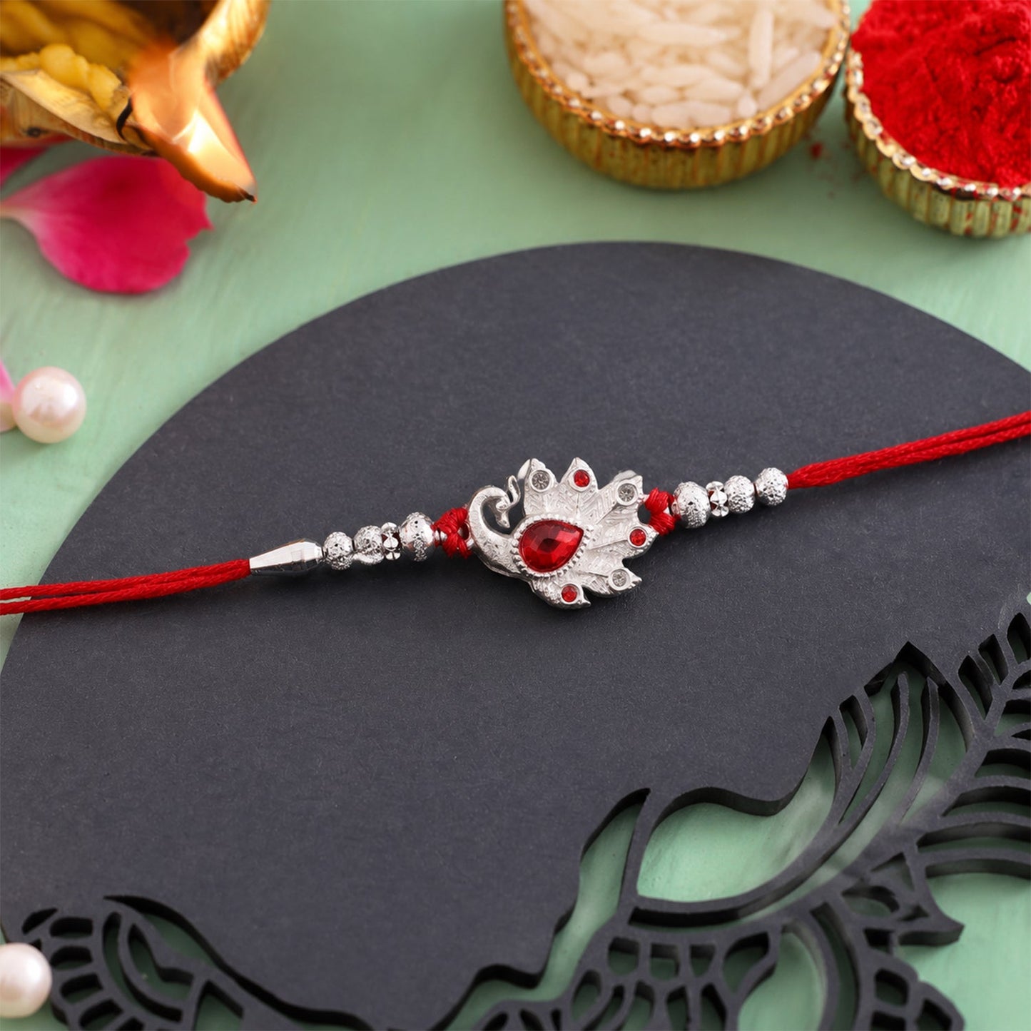 Peacock Red Stone Silver Tone Rakhi