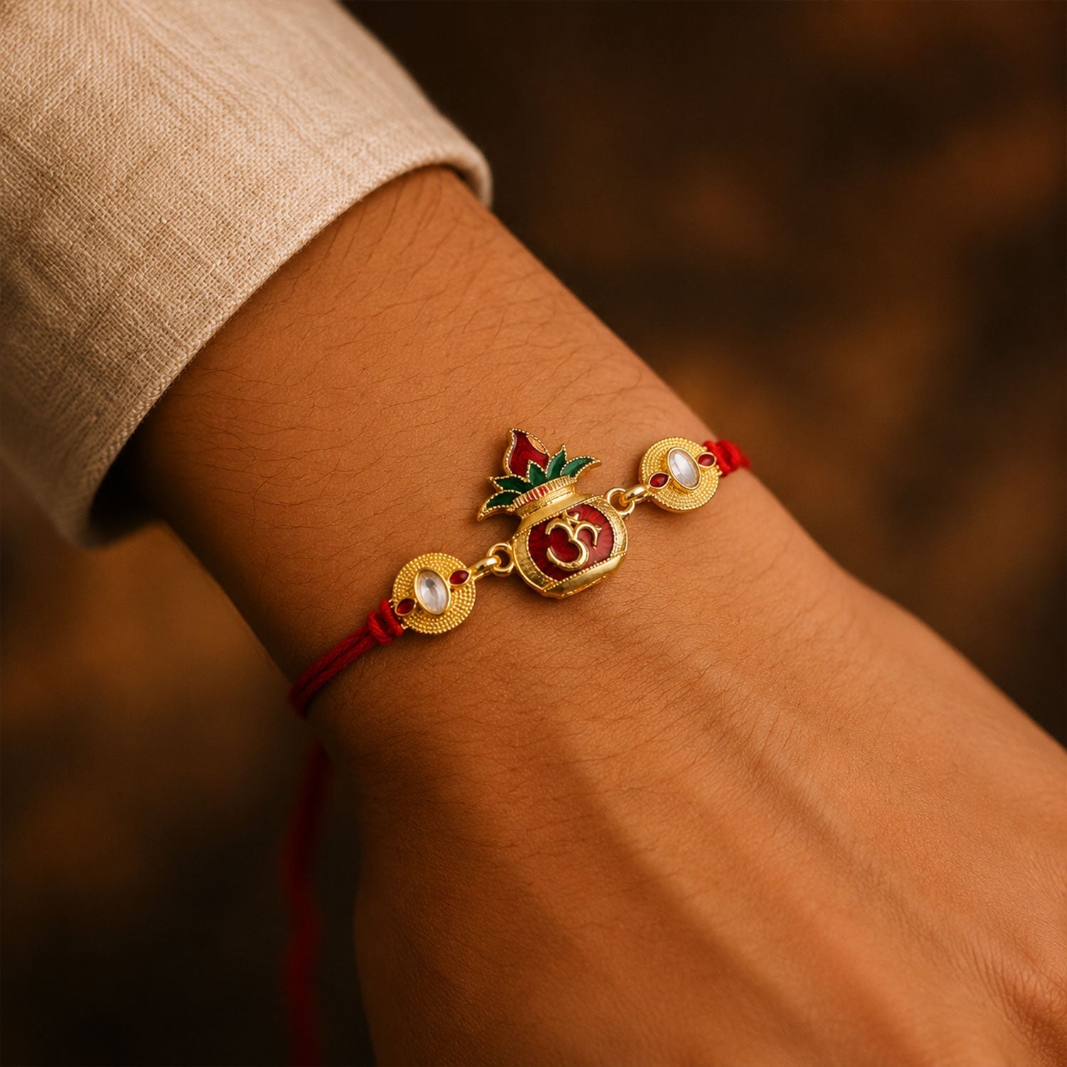 Om Lotus Red Green Enamel Gold Tone Rakhi
