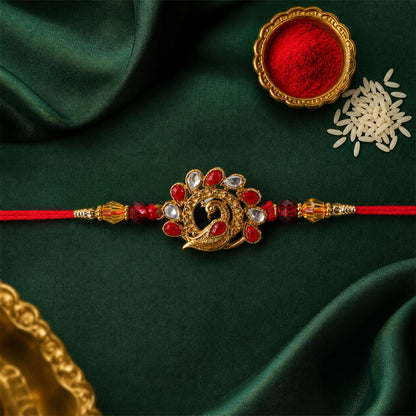 Peacock Red Stone Studded Gold Tone Rakhi