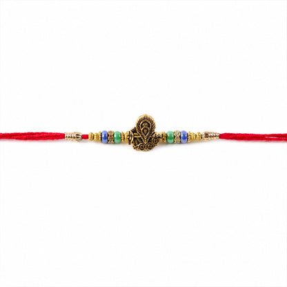 Antique Oxidized Golden Peacock Design Rakhi for Brother