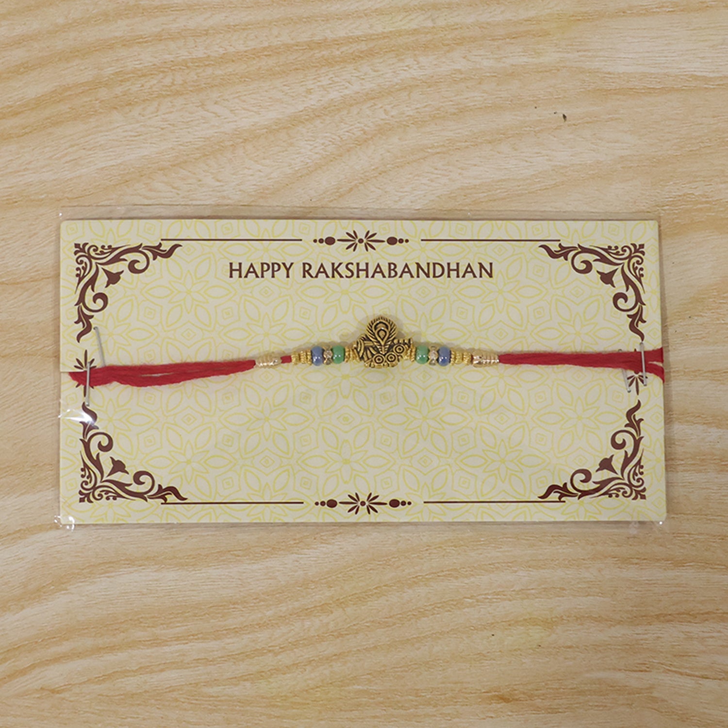 Antique Oxidized Golden Peacock Design Rakhi for Brother