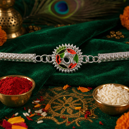 Silver Oxidized Meenakari Om Rakhi with Sunray Design