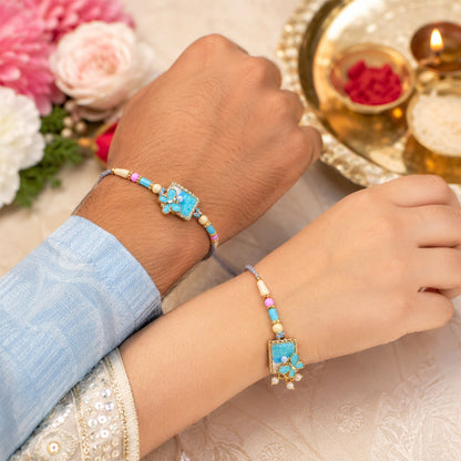 Turquoise Floral Bhaiya Bhabhi Lumba Rakhi with Pearls