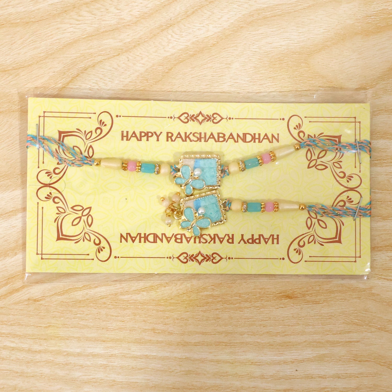 Turquoise Floral Bhaiya Bhabhi Lumba Rakhi with Pearls