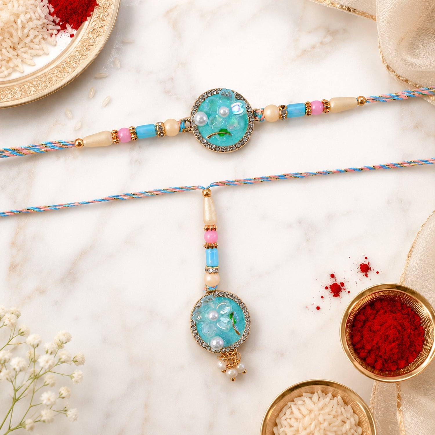 Teal Floral Bhaiya Bhabhi Lumba Rakhi with Pearl Drops