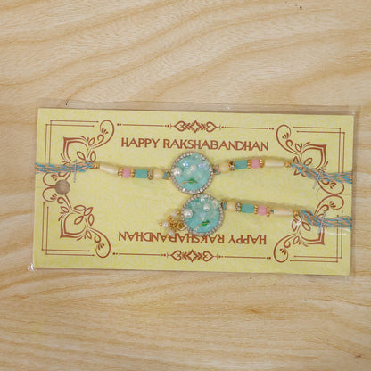 Teal Floral Bhaiya Bhabhi Lumba Rakhi with Pearl Drops
