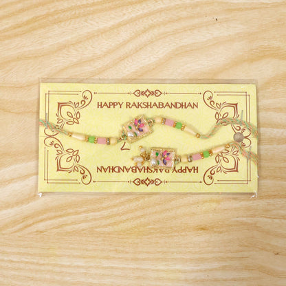 Green Floral Kundan Bhaiya Bhabhi Lumba Rakhi with Pearls
