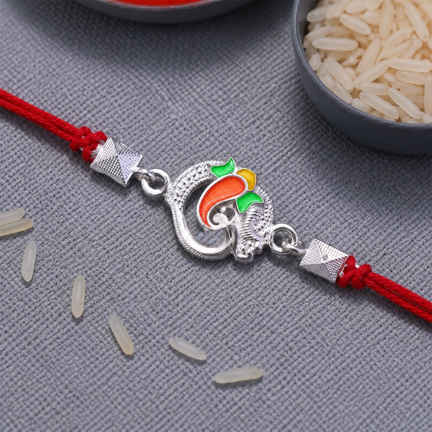 Silver Om Ganesha Enamel Bead Rakhi Rakshabandhan