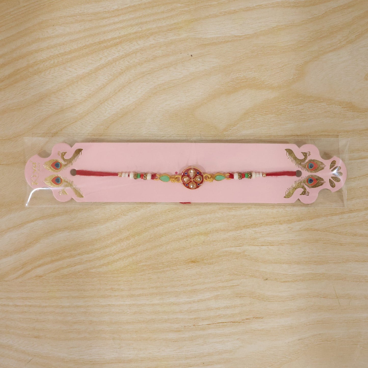 Round Kundan Enamel Floral Motif Charm Fancy Pearl Bead Rakhi for Brother
