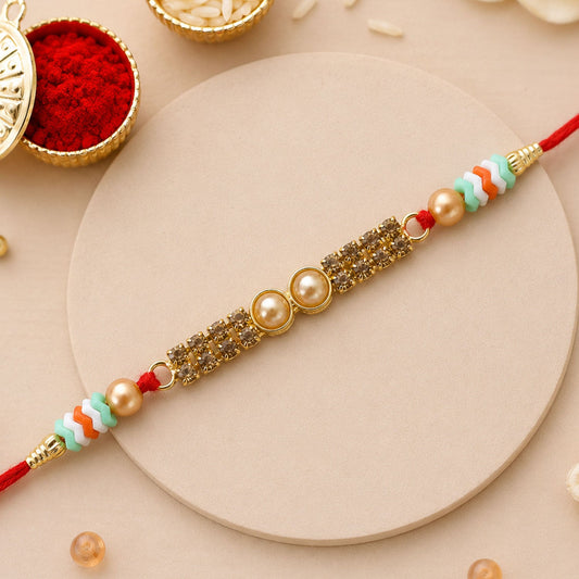 Kundan Rakhi for brother with pearl and crystal embellishments.
