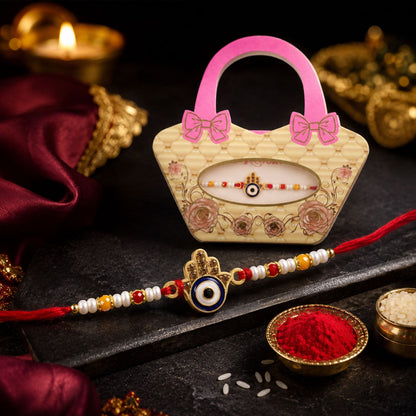 Close-up of an Evil Eye Designer Rakhi with intricate pearl bead work, ideal for Raksha Bandhan.