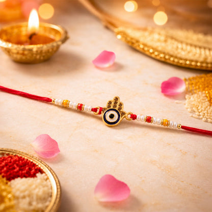 Side view of the Evil Eye Designer Rakhi, highlighting the comfortable thread and detailed craftsmanship.