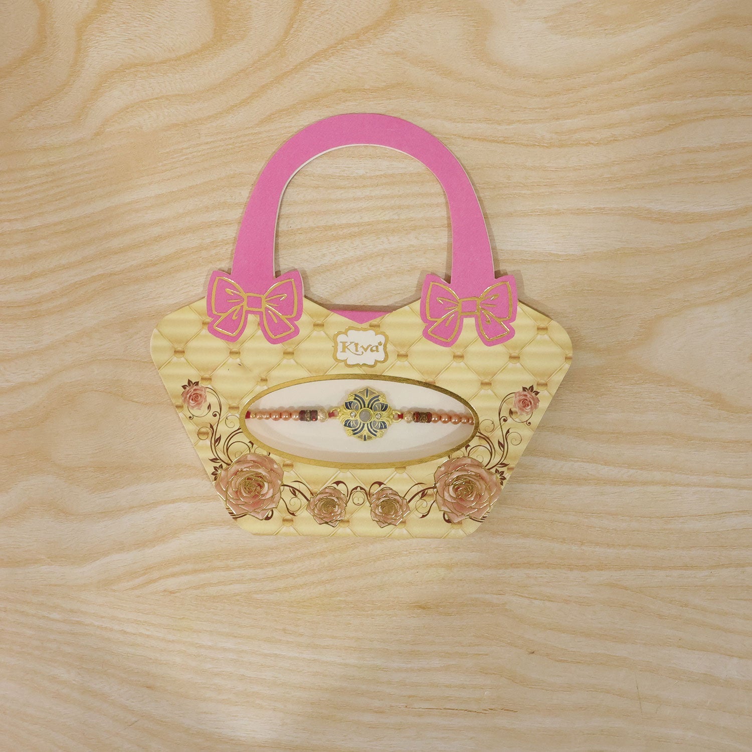 Reverse side of the floral meenakari rakhi showcasing its sturdy construction.