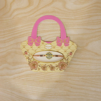 Reverse side of the floral meenakari rakhi showcasing its sturdy construction.