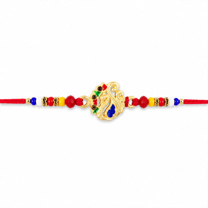 Peacock Charm Rakhi for Brother featuring a traditional design, ready for festive celebrations.