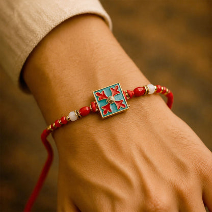 Side view of the Square Design Charm Kids Rakhi, highlighting its comfortable thread.