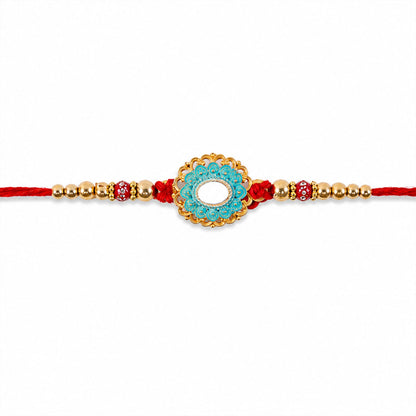 Traditional Rakhi for brother, featuring Kundan and pearls, ready for gifting on Raksha Bandhan.
