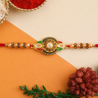 Floral rakhi for brother displayed on a festive background