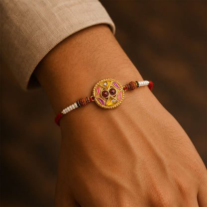 Kundan Rakhi tied on a brother's wrist, symbolising Raksha Bandhan.