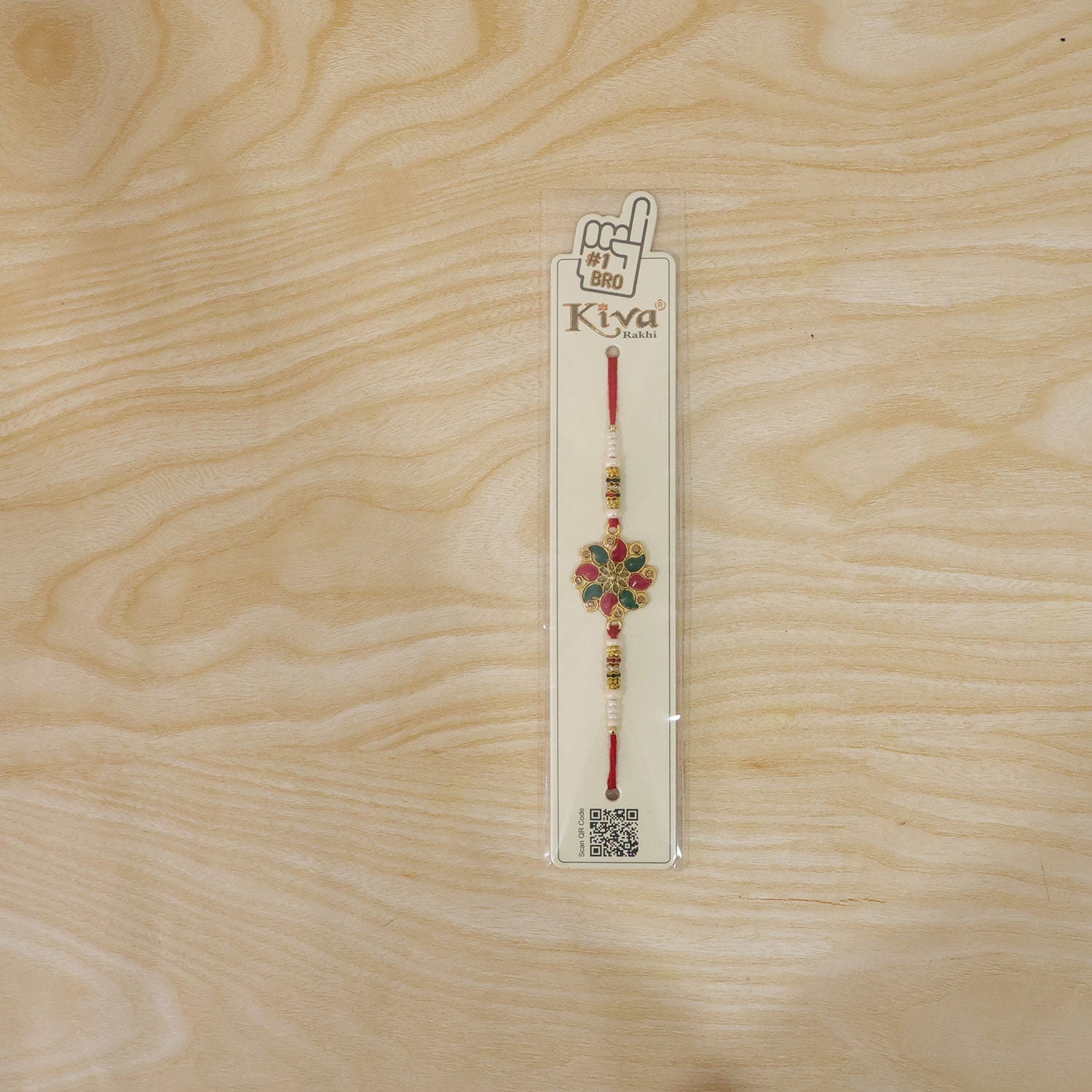 Rear view of the Floral Stone Designer Rakhi highlighting its thread texture and finish.
