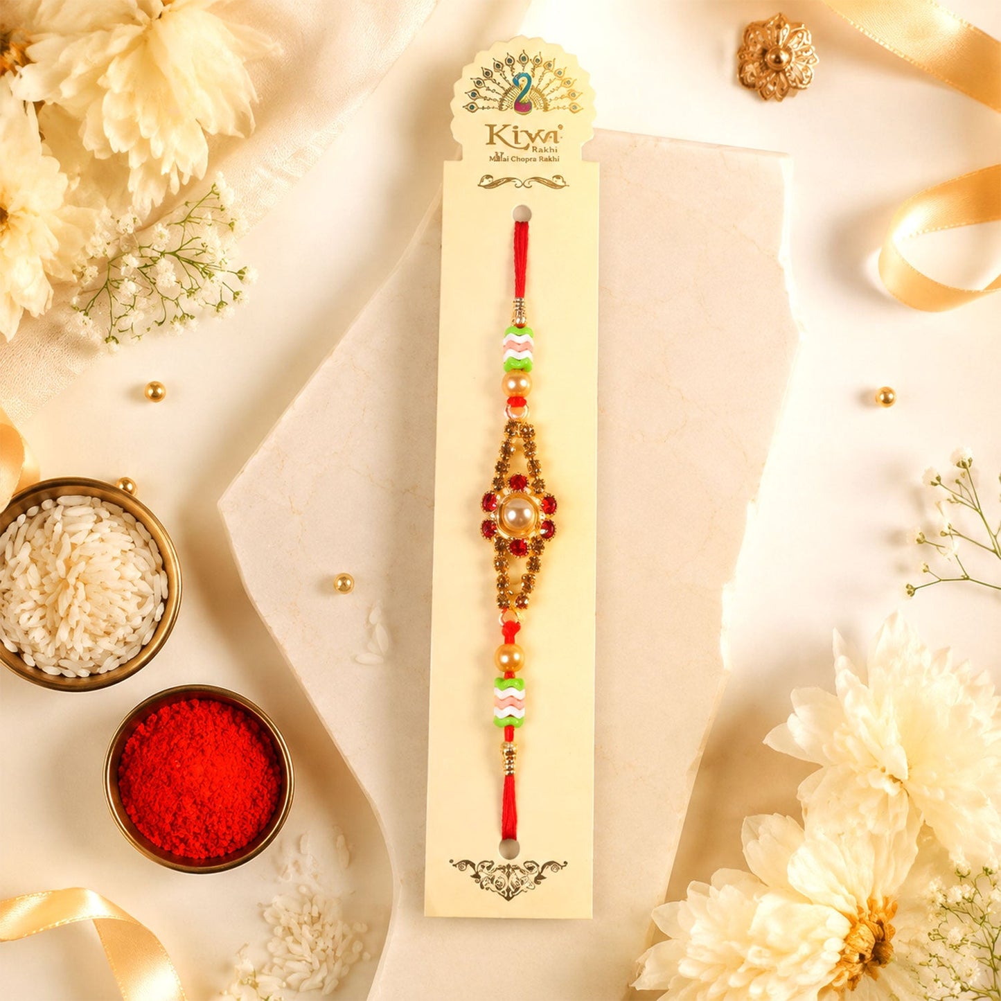 Side view of the pearl stone rakhi showcasing its intricate design.