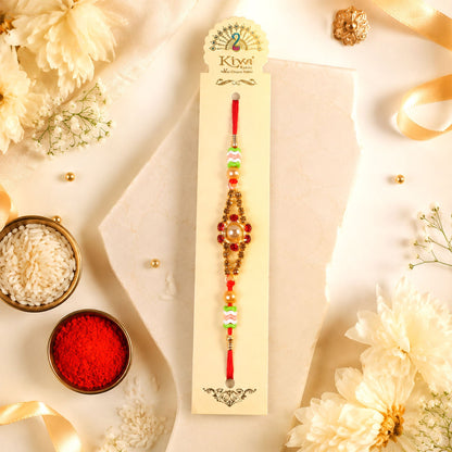 Side view of the pearl stone rakhi showcasing its intricate design.