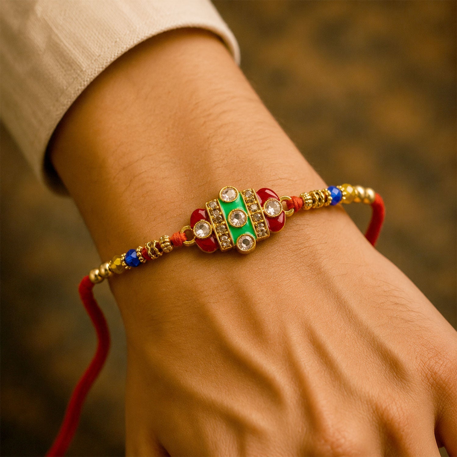 Side profile of the elegant Kundan Rakhi, highlighting the delicate stone placements.