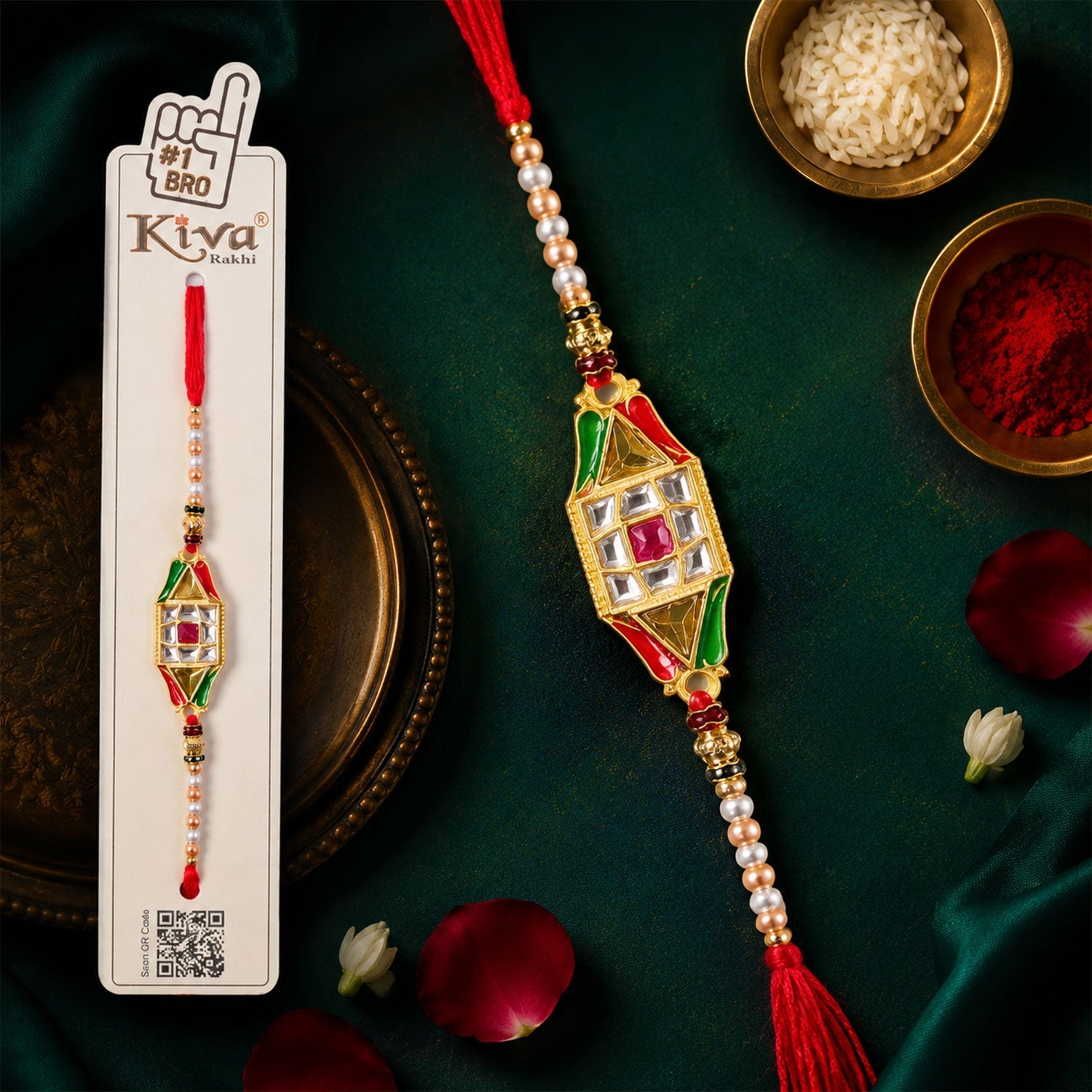 Diamond charm Rakhi for brother with pearl beads, displayed on a textured surface.