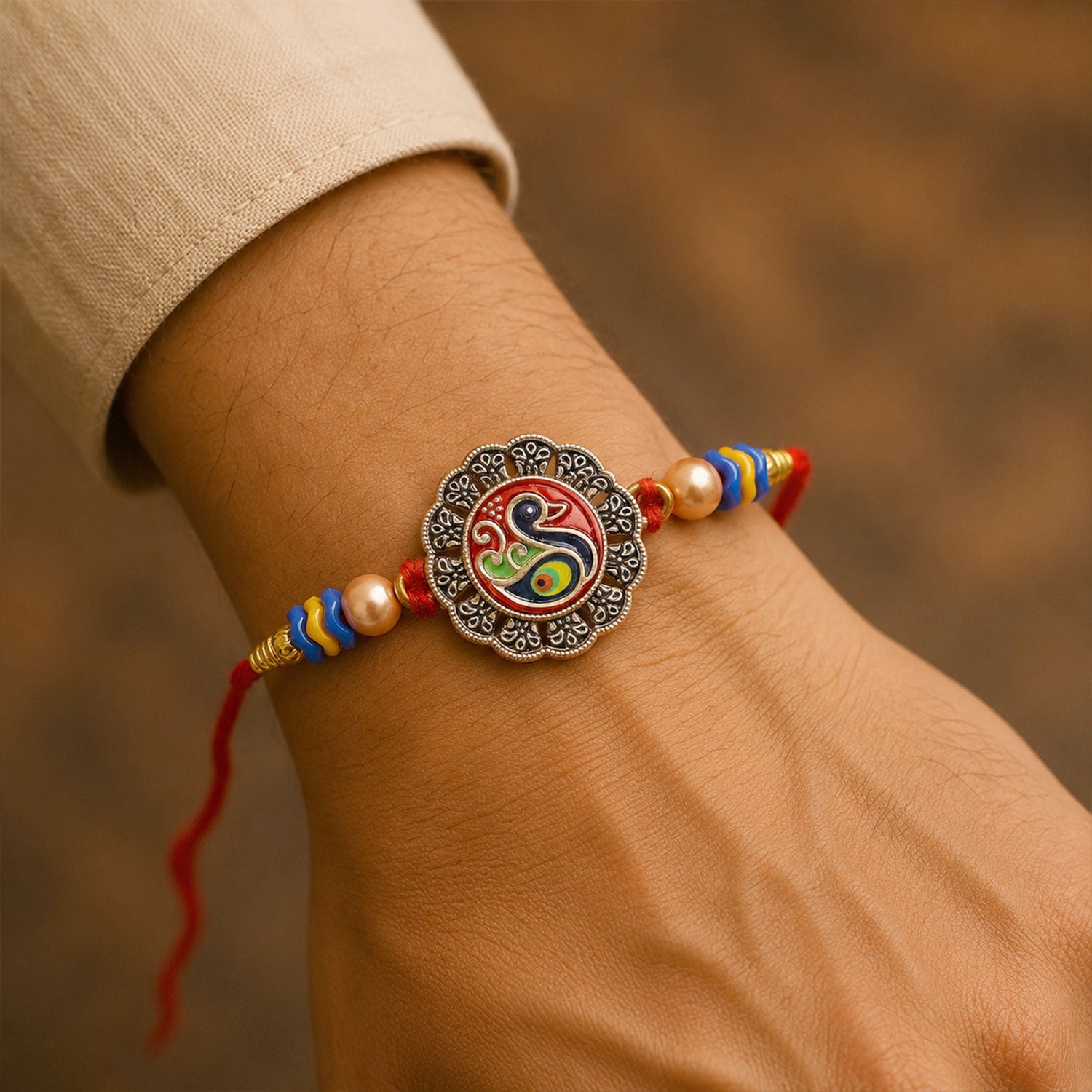 Traditional Peacock Motif Pearl Beads Designer Rakhi For Brother