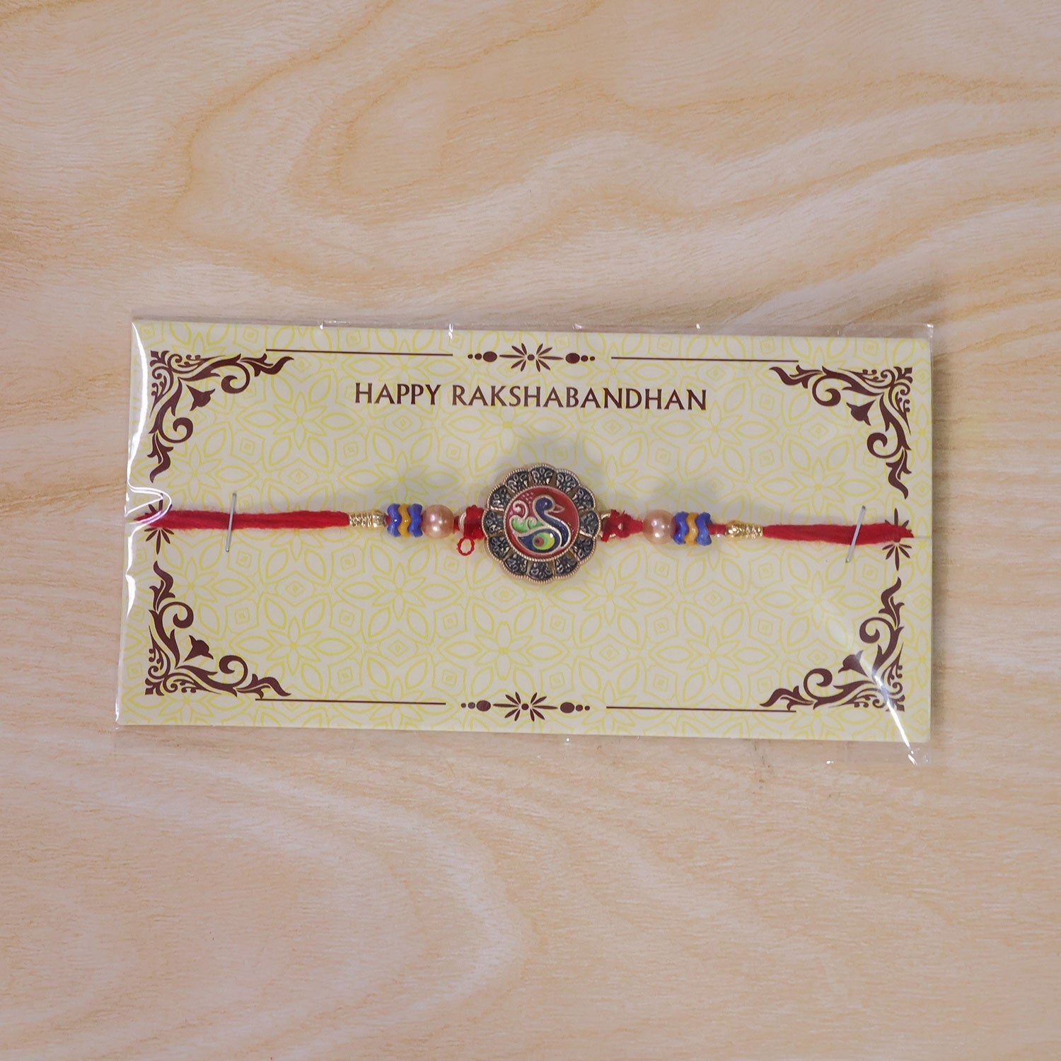 Traditional Peacock Motif Pearl Beads Designer Rakhi For Brother