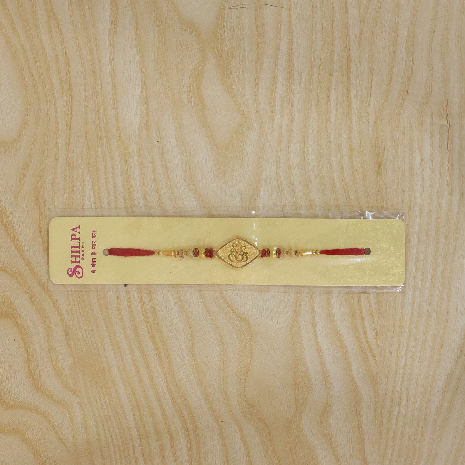 Ganesha Symbol Leaf Shape Designer Rakhi for Brother