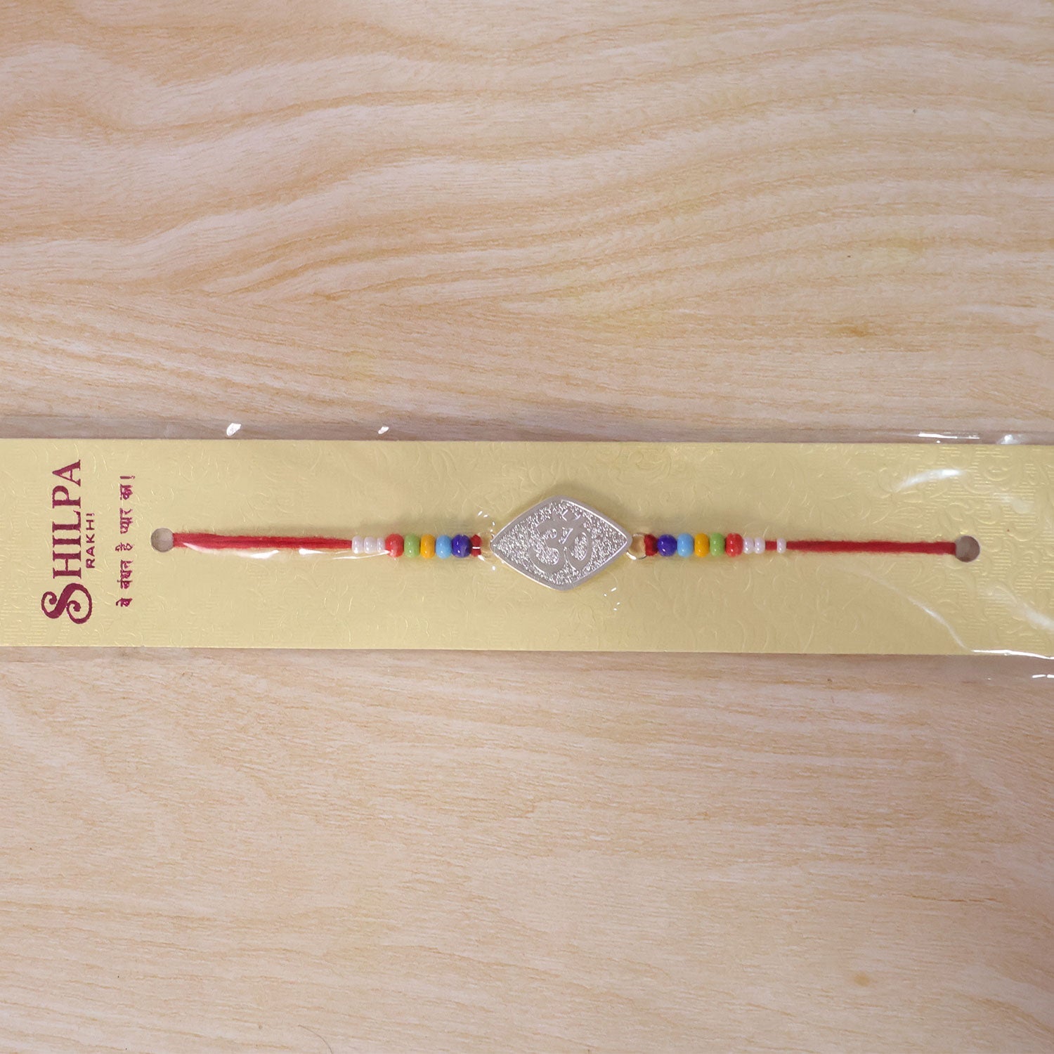 Om Symbol Beaded Designer Premium Traditional Rakhi for Brother