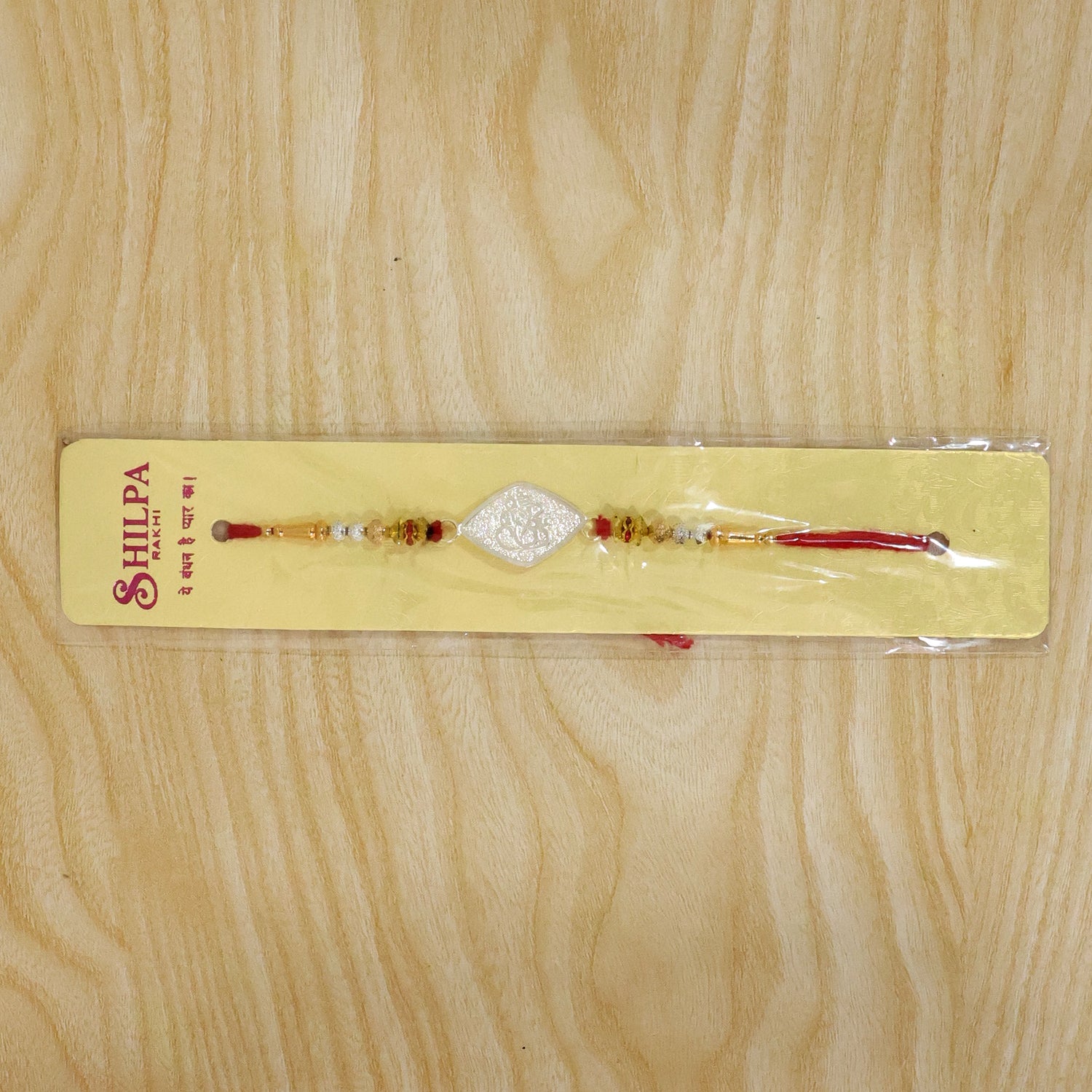 Ganesha Charm Studded Designer Rakhi for Brother