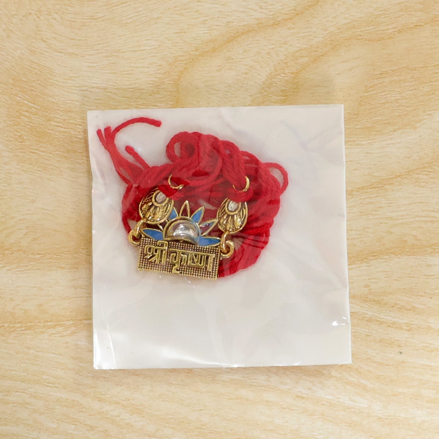 Shree Krishna Text Crown Motif Premium Designer Beaded Rakhi for Brother