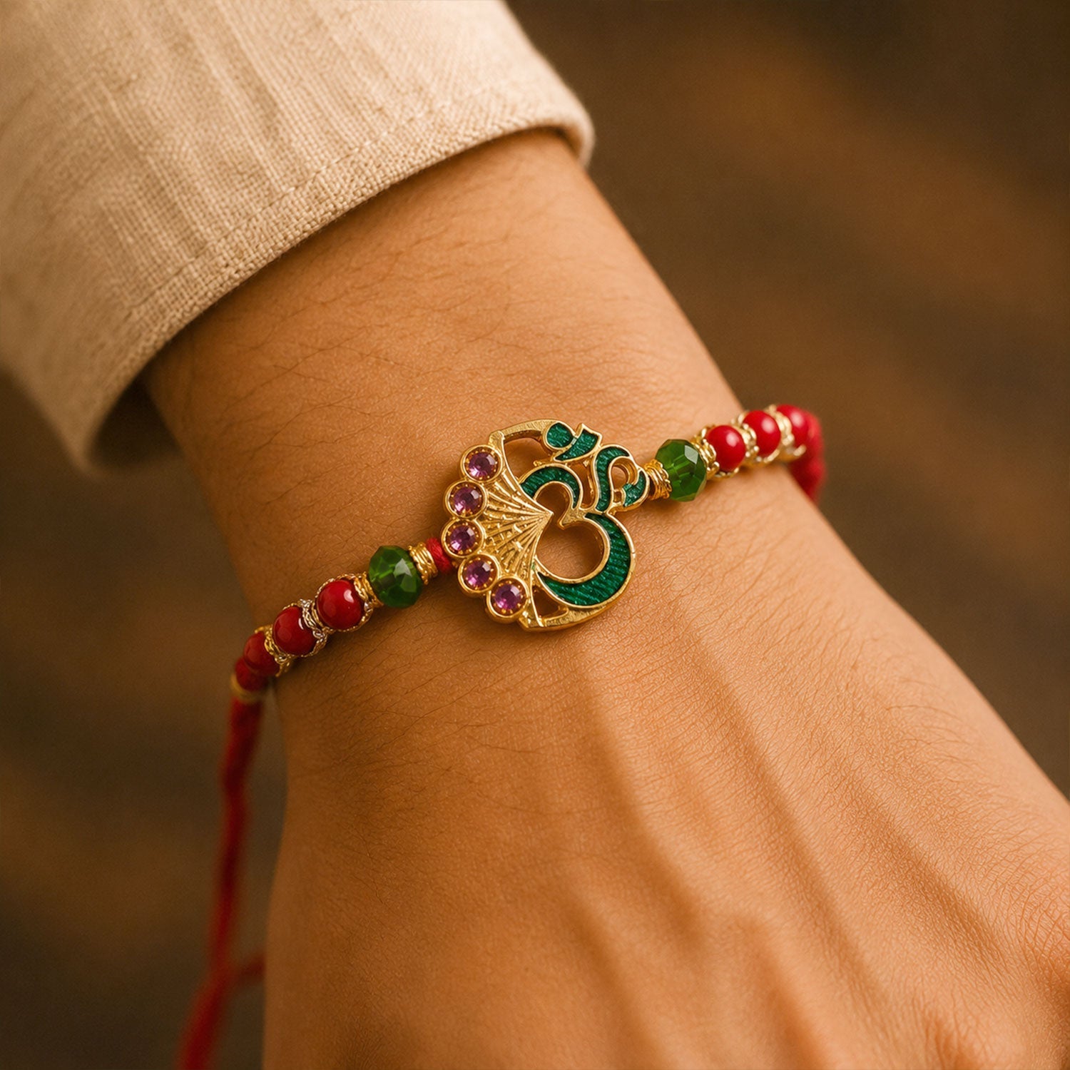 Ornate Om Motif Stone Studded Premium Designer Rakhi for Brother