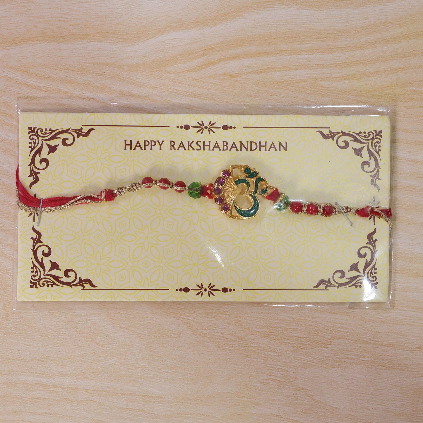 Ornate Om Motif Stone Studded Premium Designer Rakhi for Brother