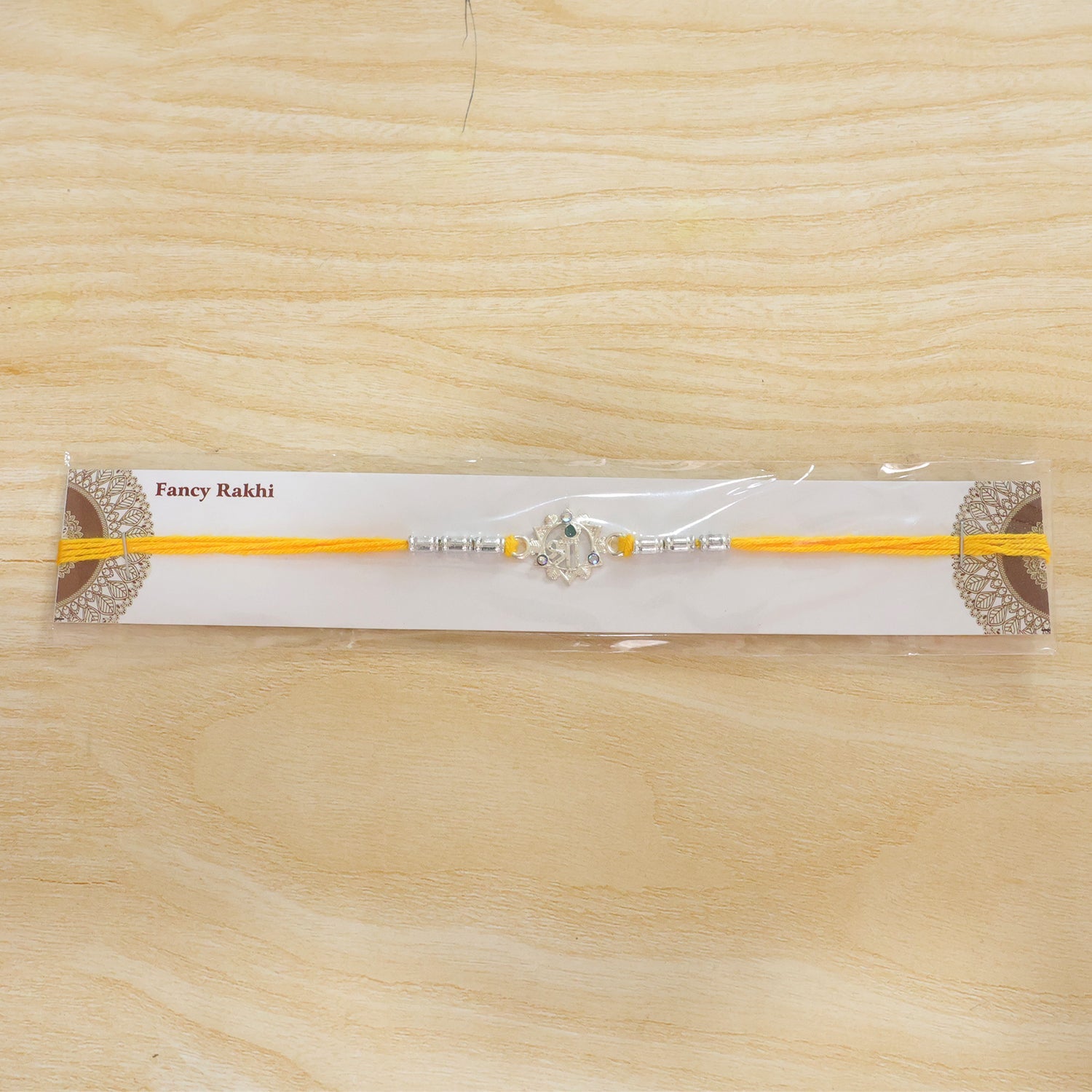 Round Shree Text Motif Designer Rakhi for Brother