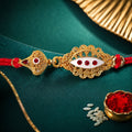 Oval Stone Studded Traditional Rakhi for Brother
