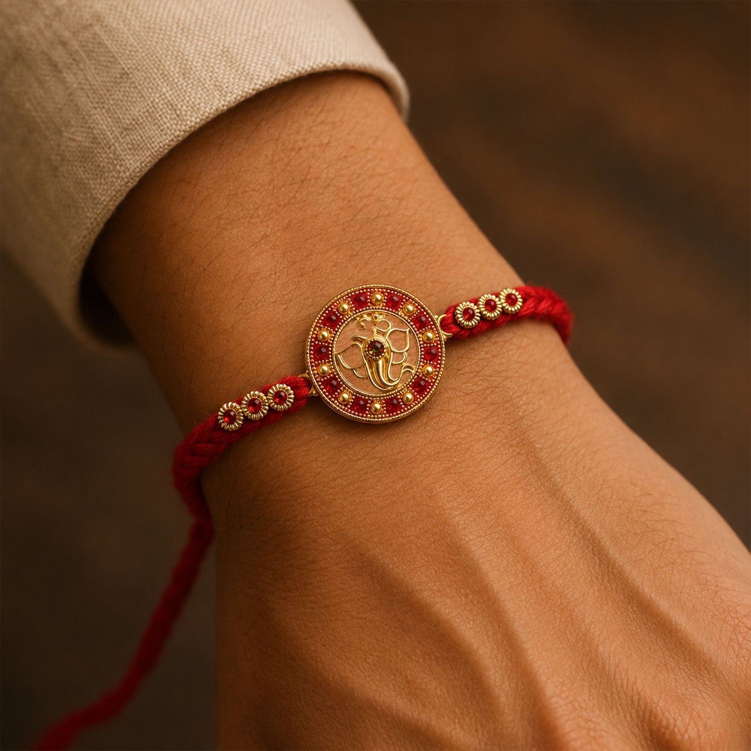 Divine Ganesha Round Rakhi with Stone Studded Border Rakhi for Brother