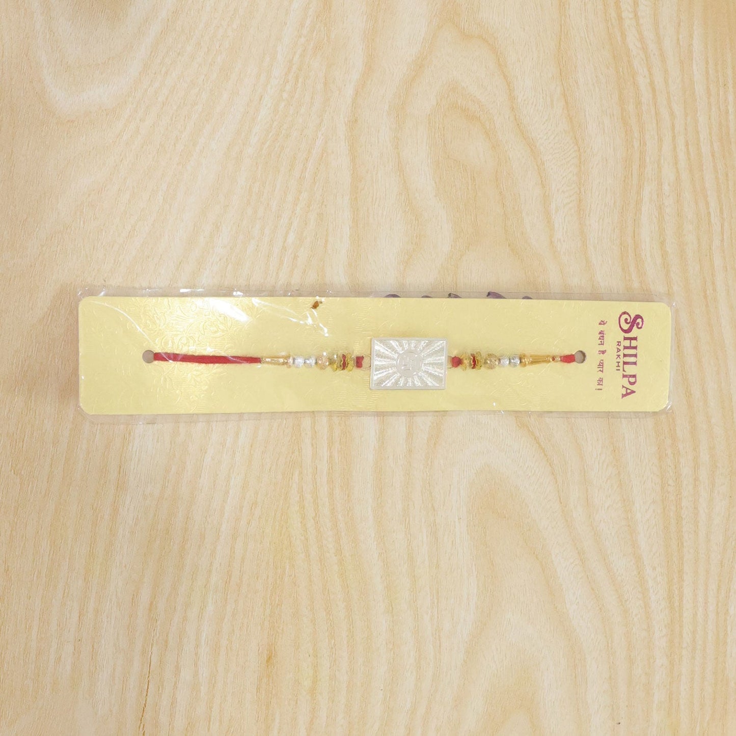 Om Symbol Square Medallion Designer Rakhi for Brother