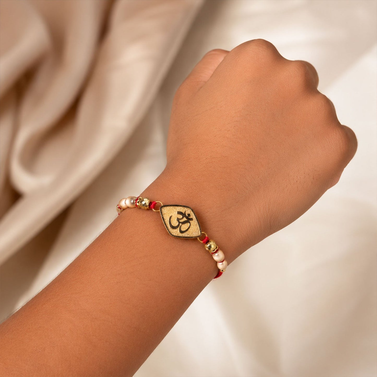 Om Symbol Shape Beaded Designer Rakhi for Brother
